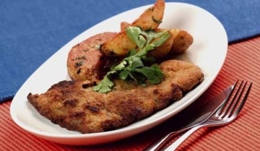 Milanesas de lomo con papas cajun