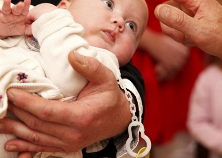 Obligaciones de los padrinos de bautismo