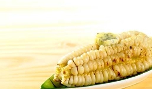 Choclos asados en salsa de ají