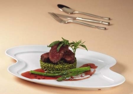 Lomo de alpaca con risotto verde de trigo y salsa de pimienta molle