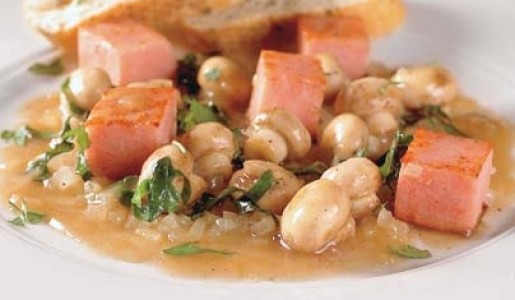 Dados de jamón con champiñones