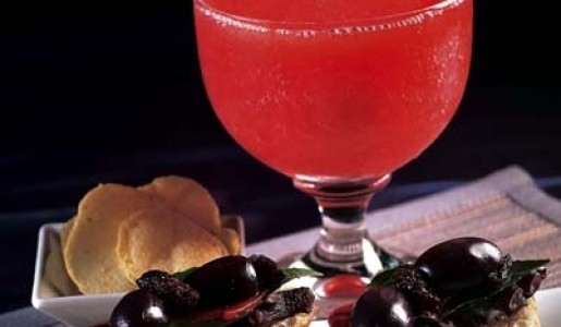 Montadito de pulpo, pimiento y chips de papas