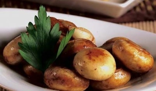 Champiñones flambeados al pisco